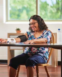 Woman checking her blood pressure