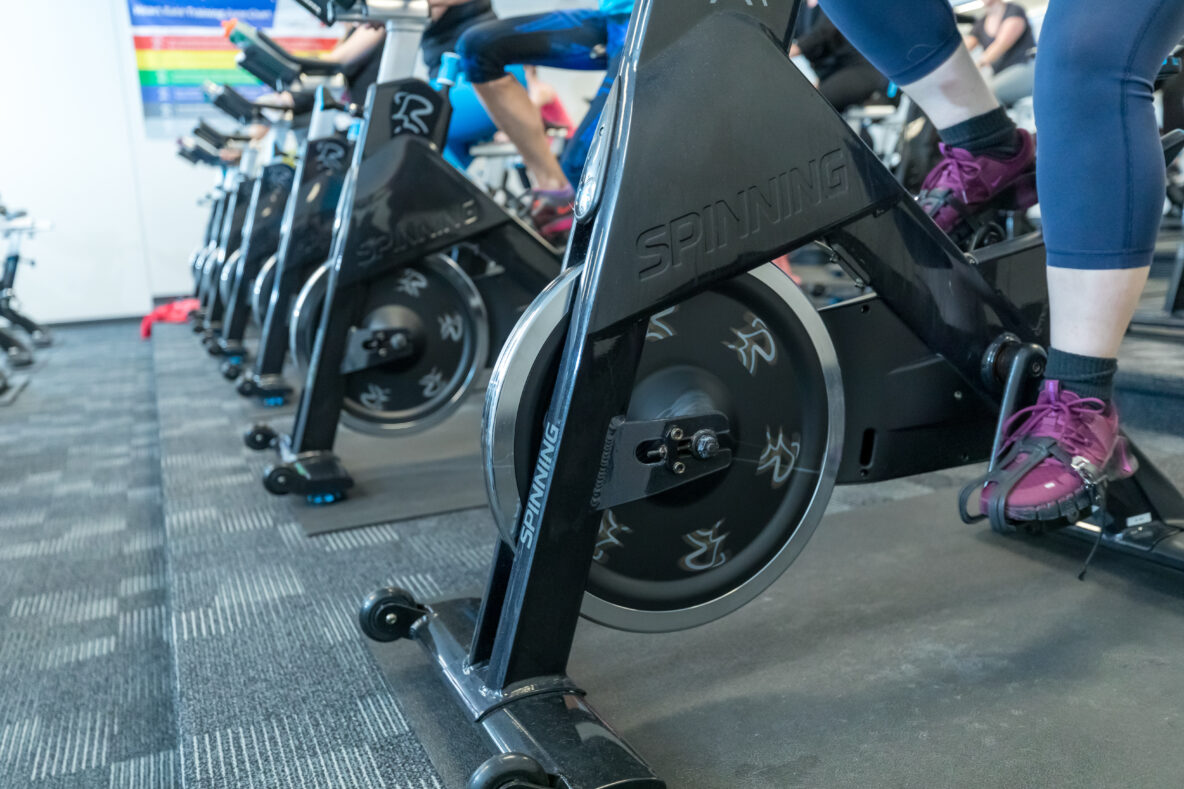 close up of stationary bikes in a cycling studio