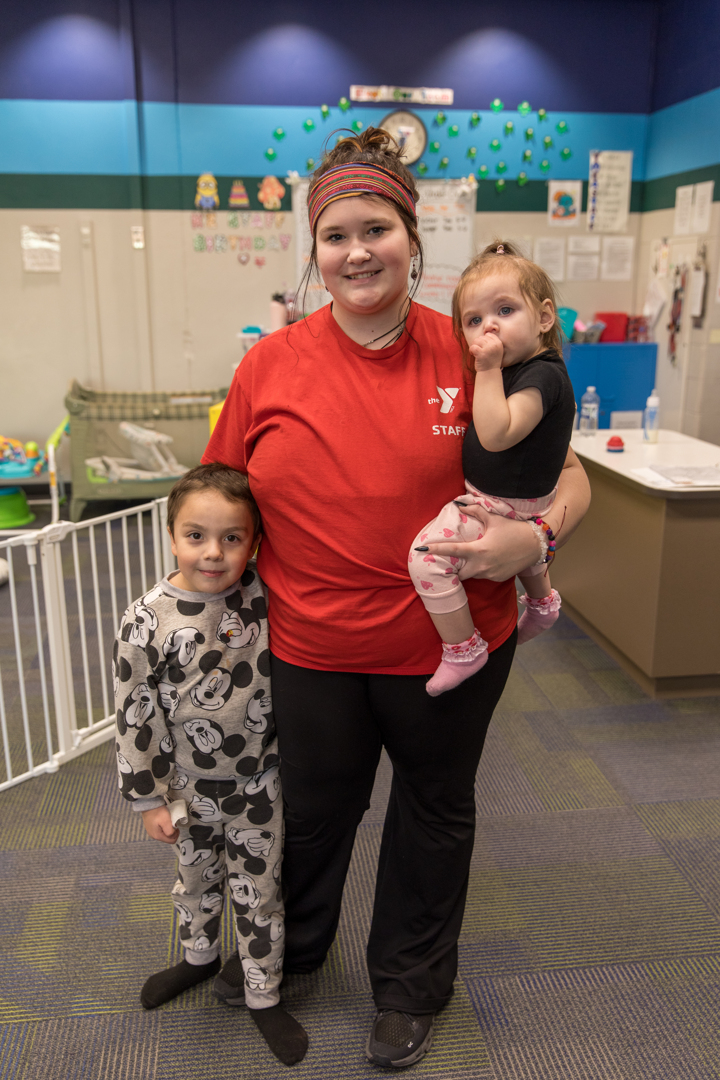 Kids with YMCA Kid Zone staff